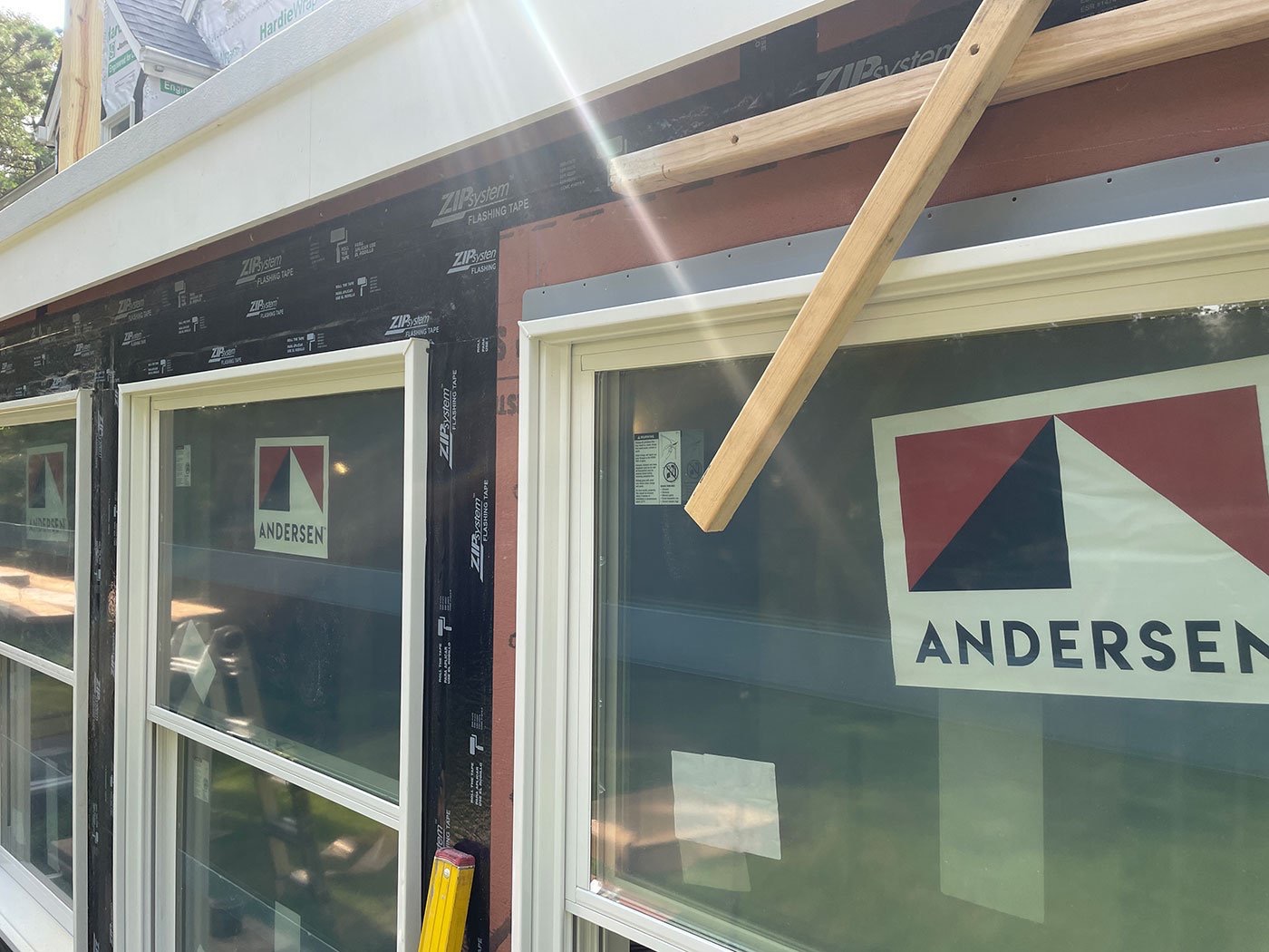 An exposed Andersen opening shows the flashing and wall layers that are hidden after finish work is restored.