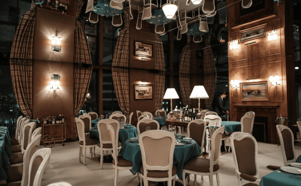 Caviar Kaspia residency in Spring Place’s Sunken Living Room with mirrored ceiling and Parisian style banquettes