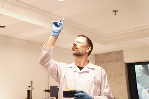 Sean looking at tube