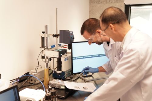 Scaling Up Microfluidic Particle Production: Approaches, Challenges, and Opportunities