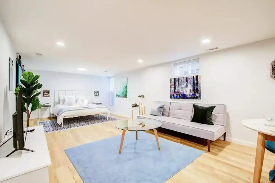 a living room with a couch and a table