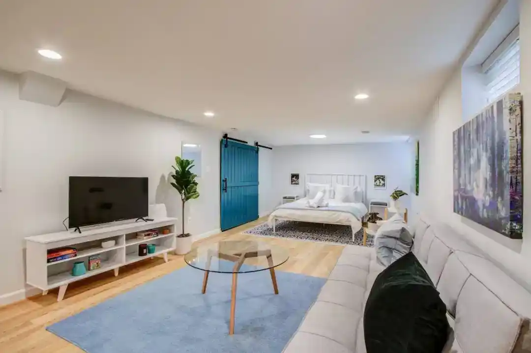 a kitchen with a table and chairs