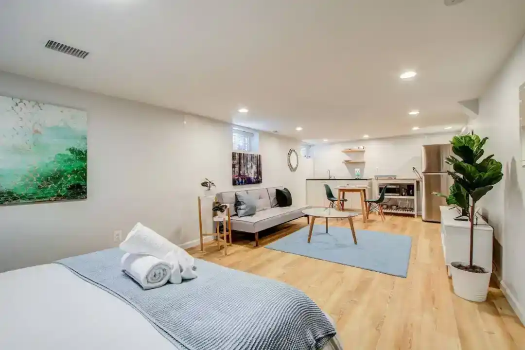 a large bedroom with a king-size bed