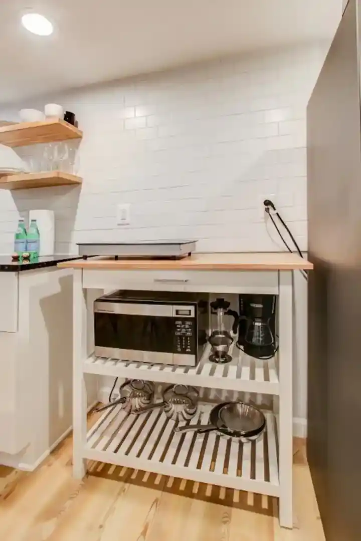 a bathroom with a shower and a mirror