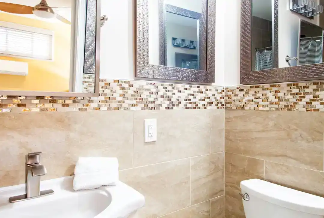 An inviting townhouse in Washington DC with a bathroom featuring a sink and a shower curtain