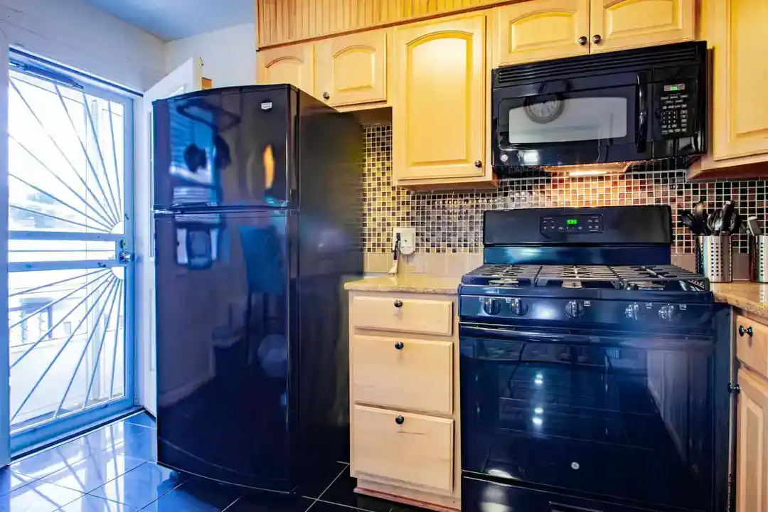 A cozy townhouse accommodation in Washington DC with a bathroom including a sink and a mirror