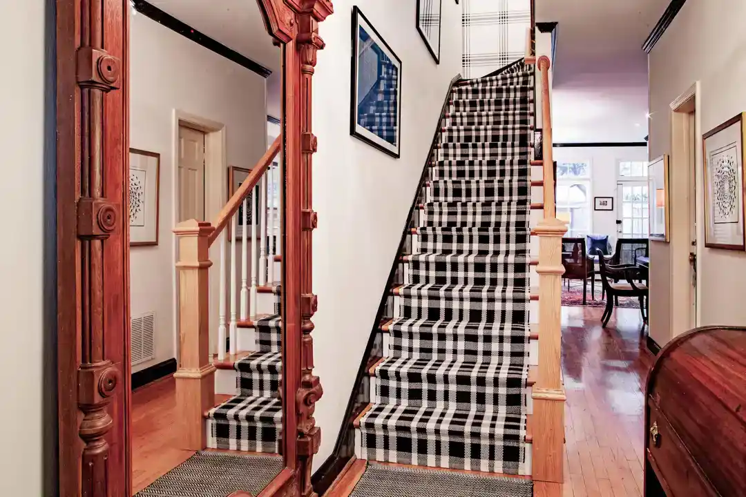 a elegant hallway with wood floors