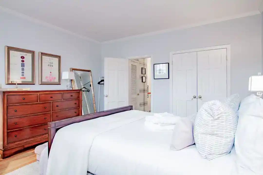 a deluxe bedroom with a large bed