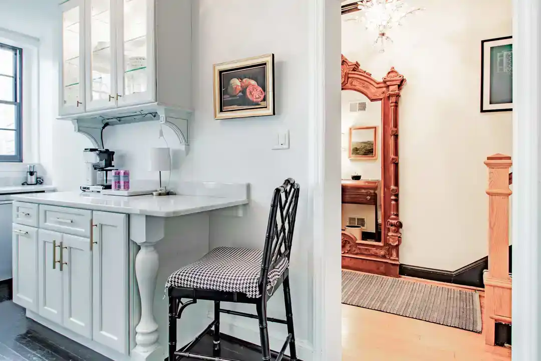 a minimalist chair and a desk in a room