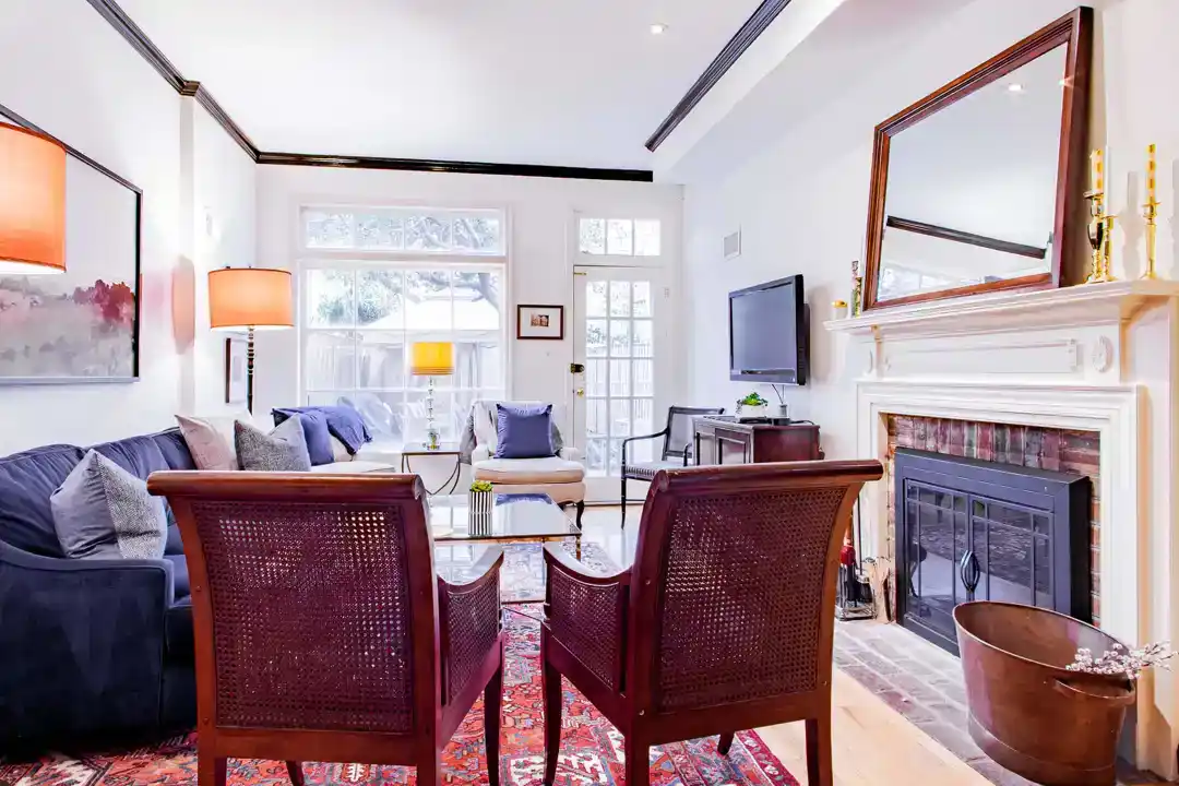 a warm living room with a fireplace