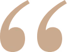 Beige stylized double quotation marks symbol.