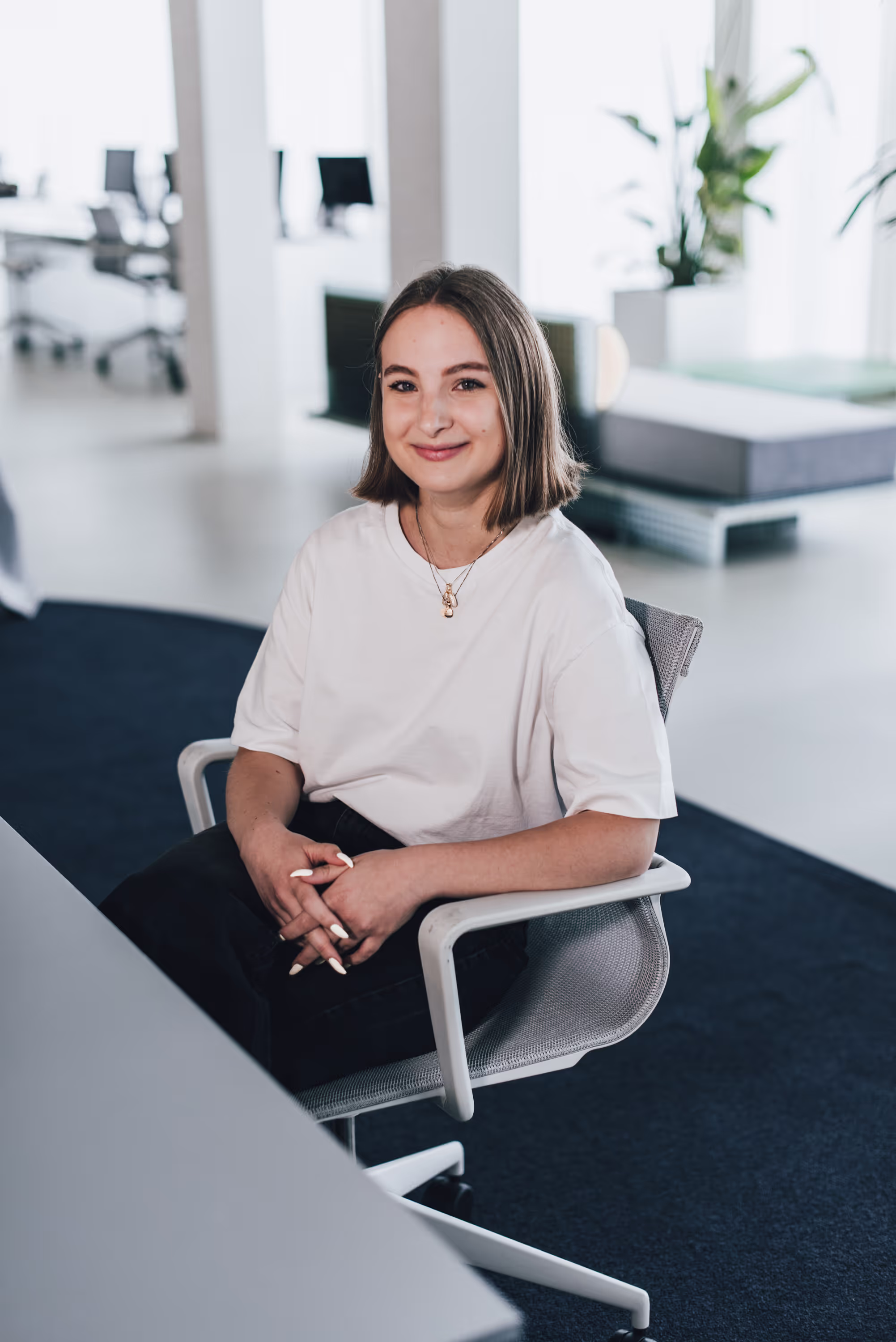 Woman Sitting In Office