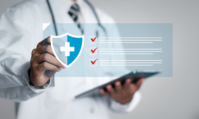 Doctor using digital tablet