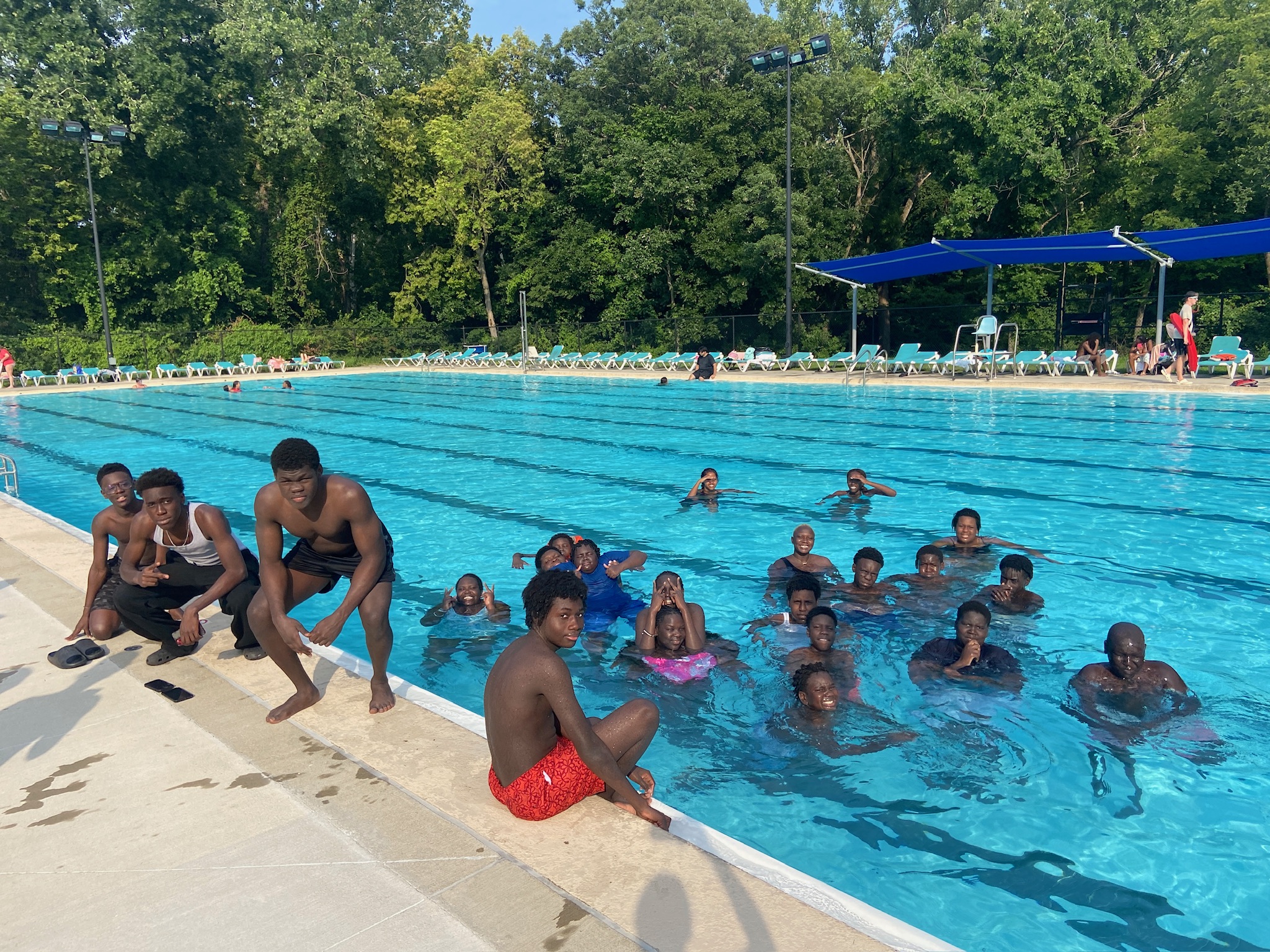 Photo of group of youth inside of a swimming pool