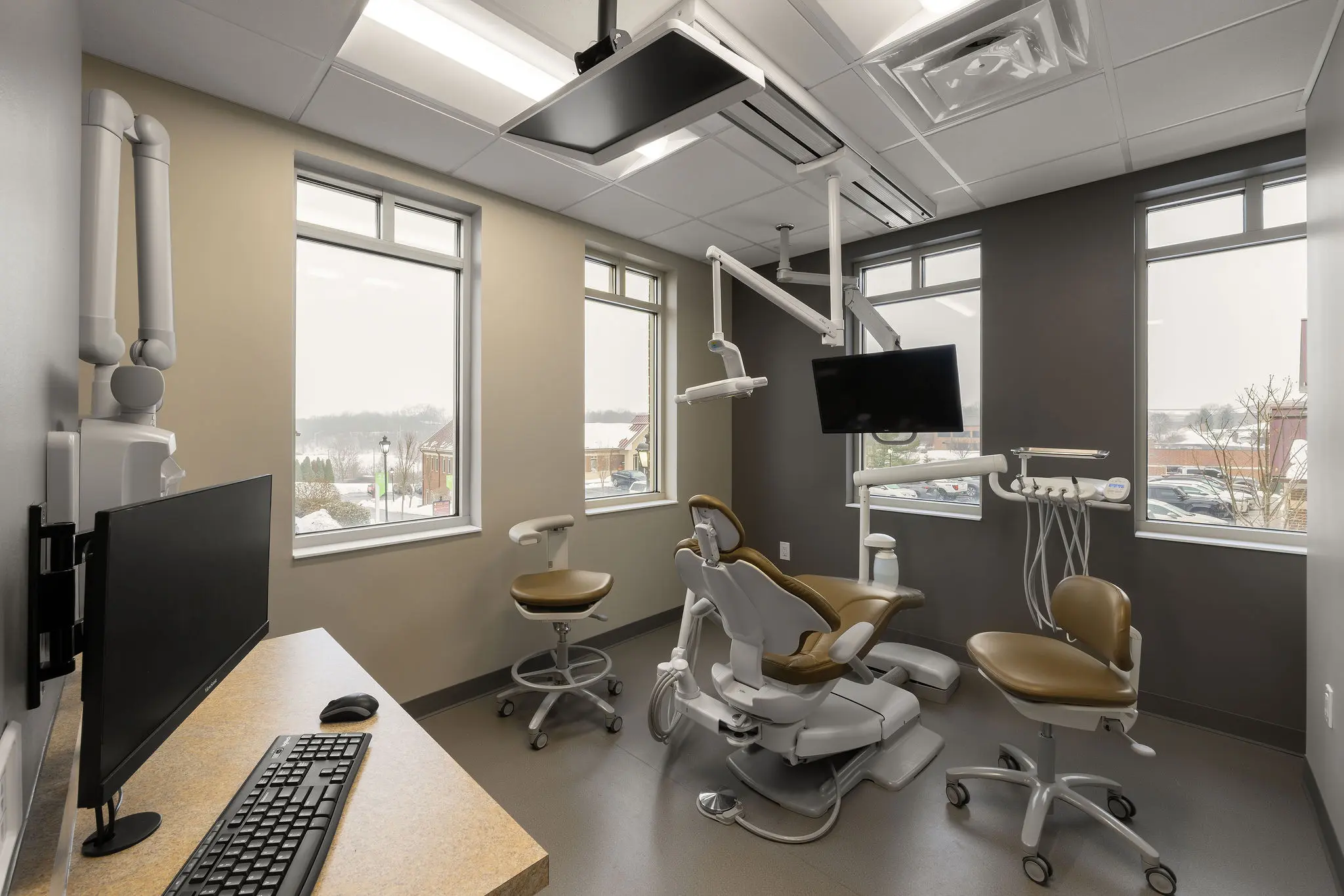 Dental operatory at Parker Periodontics, designed for efficient workflow and patient comfort by Perry Contracting.