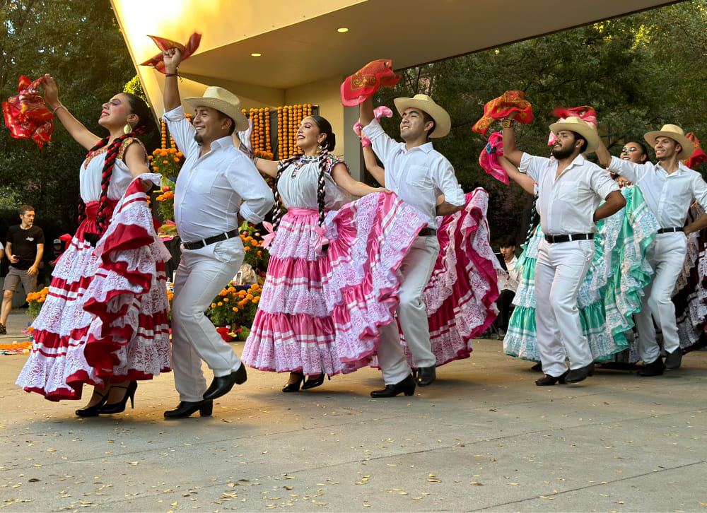 people dancing a traditional hispanic dance