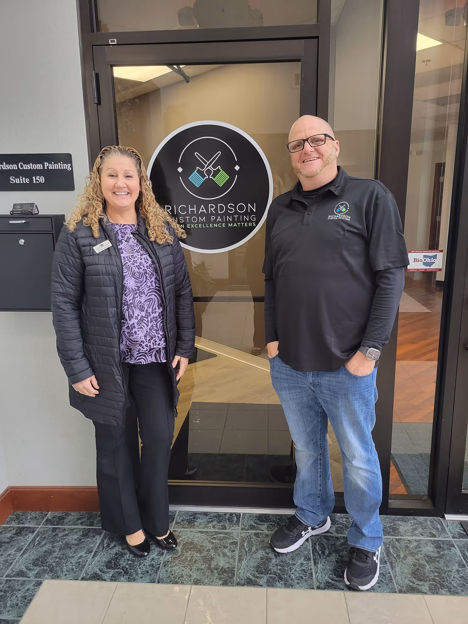 Greg in front of his office