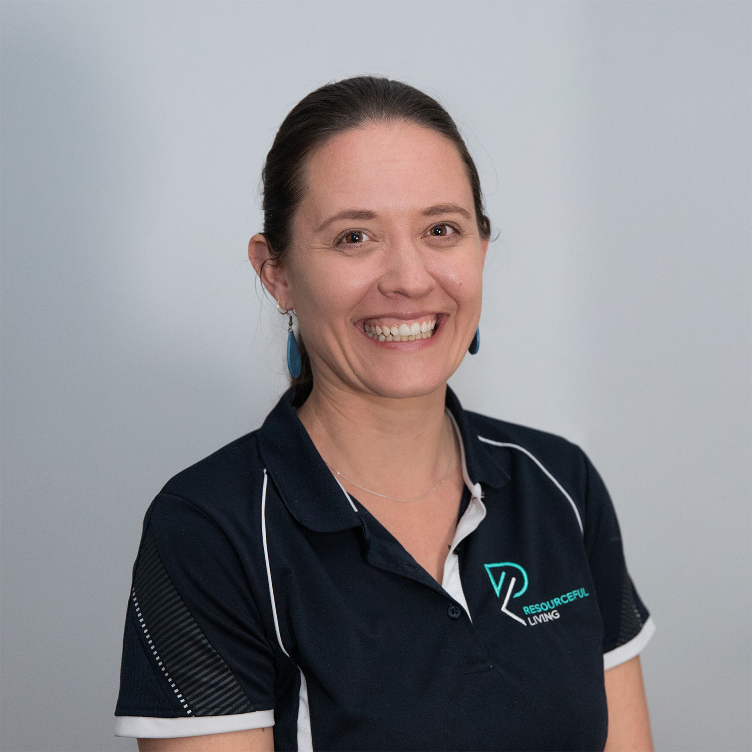 Jess Hodge portrait against a light background