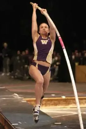 Kate Conwell pole vaulting during a track event