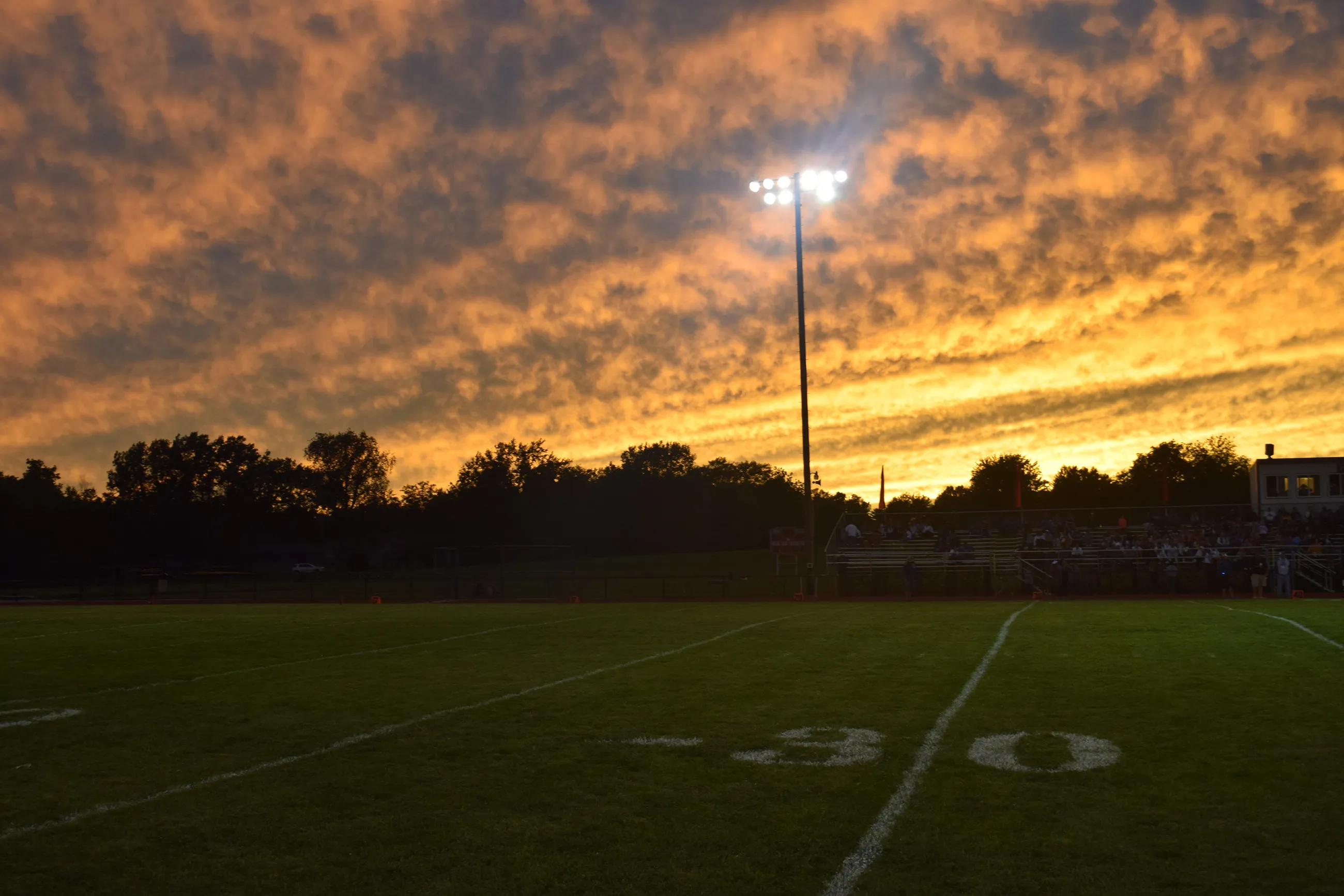 A football field during sunset