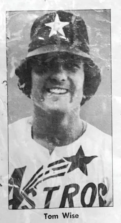 Black and white portrait of baseball player Tom Wise wearing an Astros uniform and cap with a star emblem.