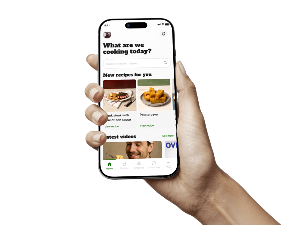 A hand holding up an iPhone with the app screenshot