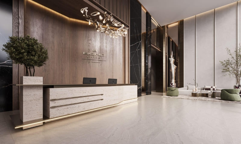 Concierge desk in boutique-style Dubai residential lobby with five-star hotel design elements