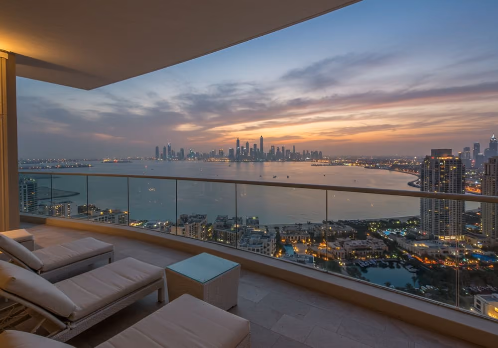 Apartment balcony view over Dubai skyline at dusk