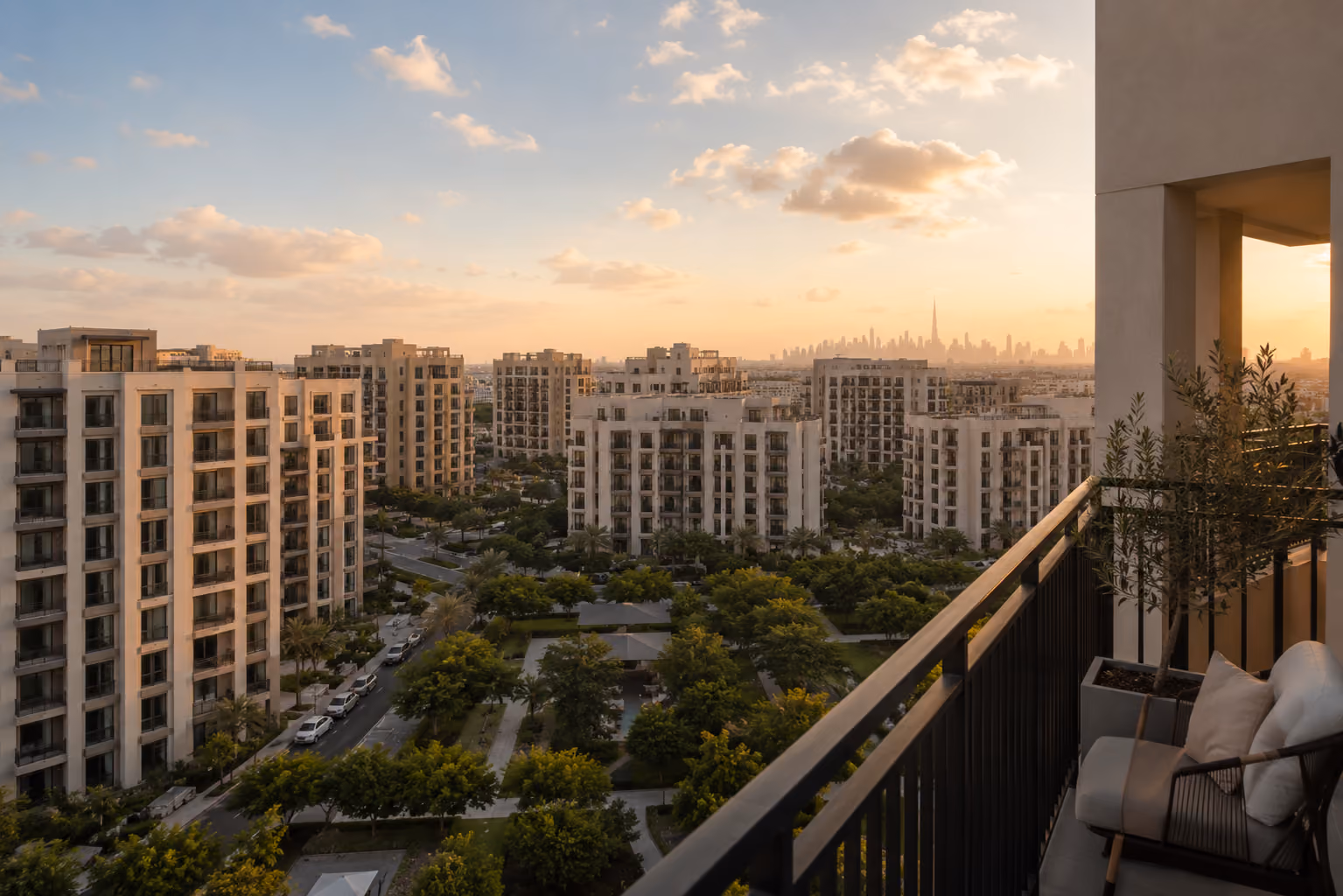 View from DLRC apartment balcony showing community skyline mid-rise buildings and open spaces