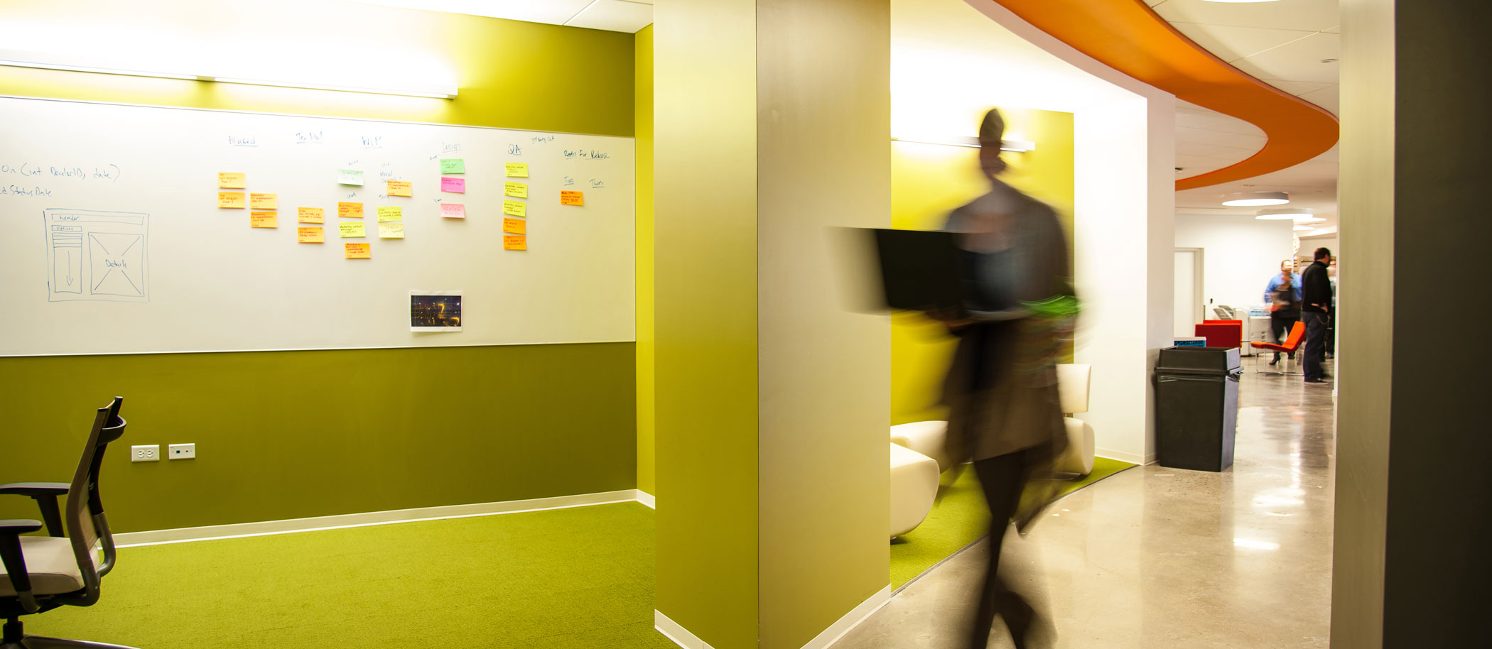 An image of a company's notice board that contains notes and notices for employees to read.
