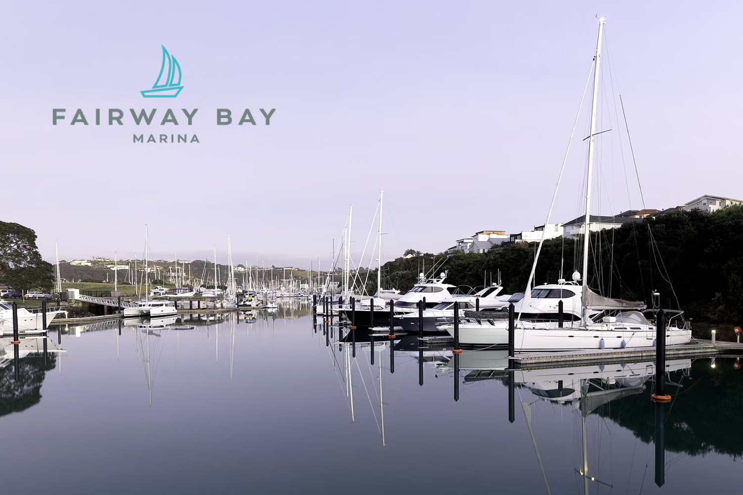 Image of boats and yachts anchored at their pens in a beautiful marina