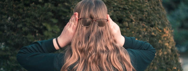 Woman wearing glasses on the back of her head