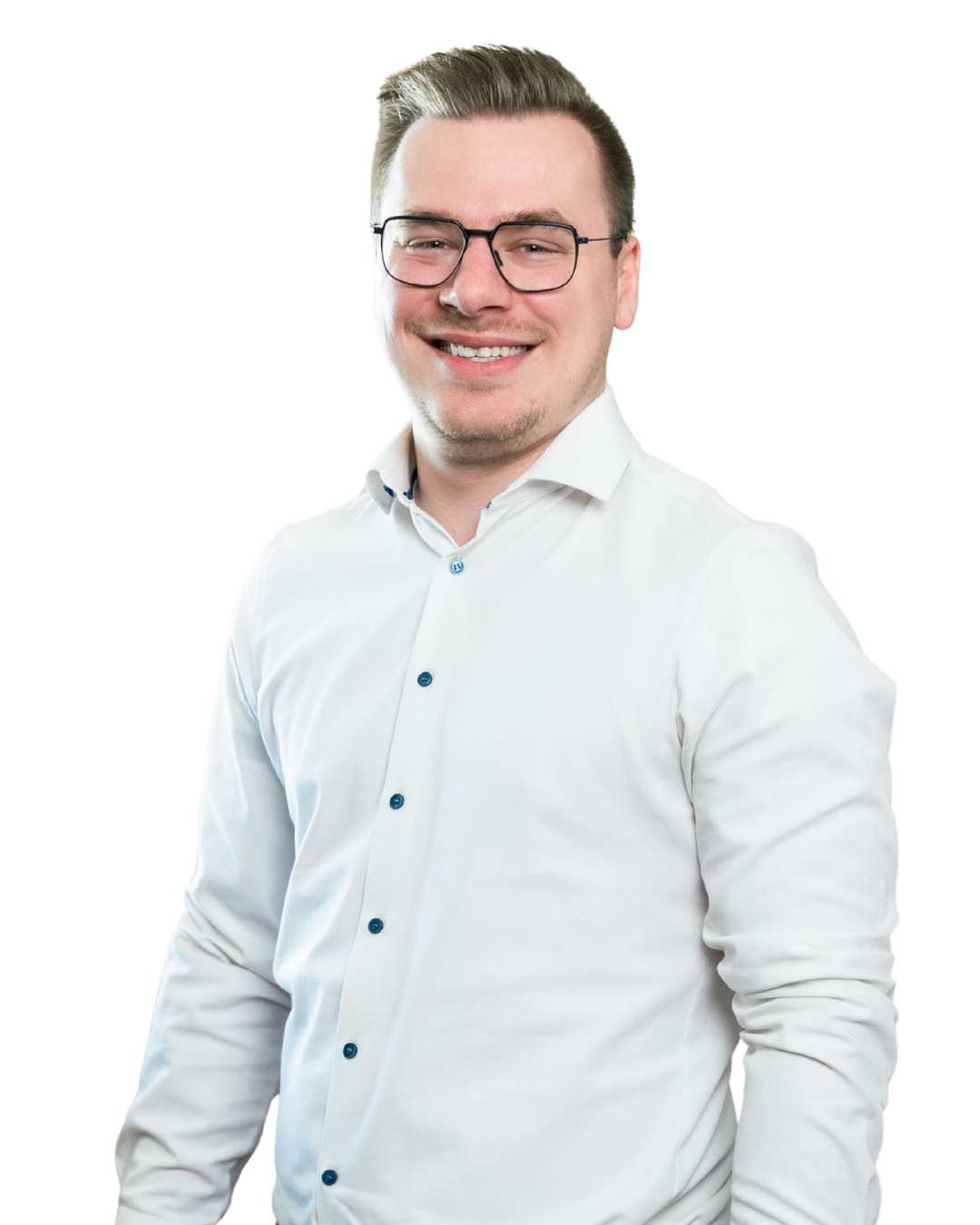 Smiling man with glasses wearing a white buttoned shirt against a plain background.