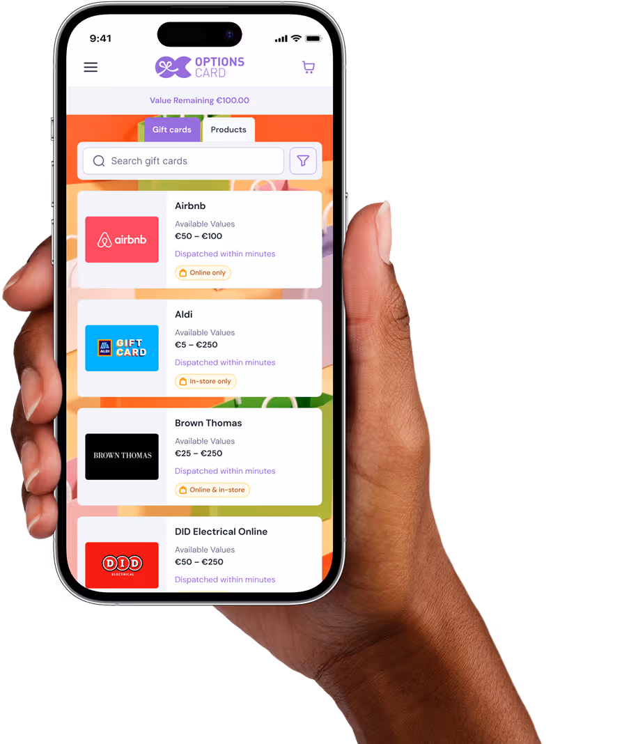 Woman holding a phone displaying retail gift card in the OptionsCard  webshop