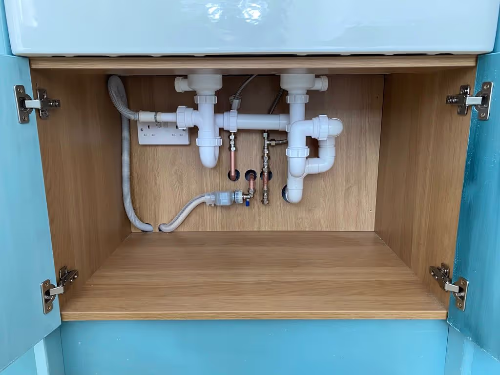 Residential plumbing installation in Wimbledon, London with top-quality materials.