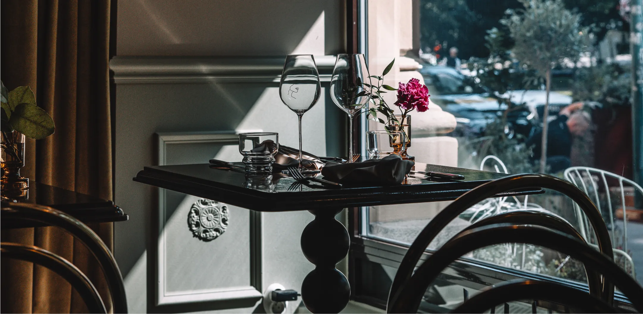 Rue Madame restaurant set dinner table with wine glasses in Helsinki