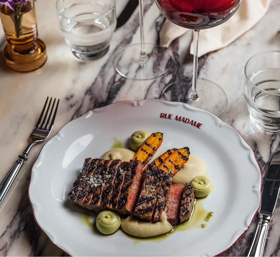 Rue Madame restaurant served plate with food