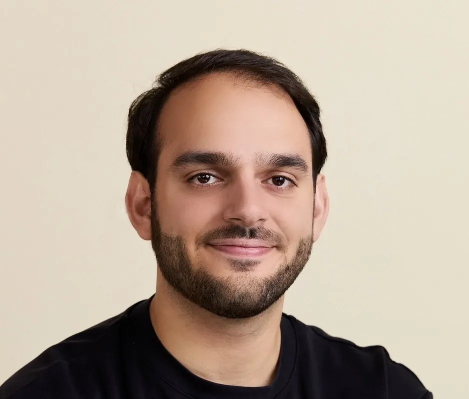 Headshot of founder, Josh Sach