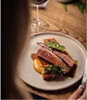 Plated main course with roast vegetables, captured at Neighbourhood — a refined christmas restaurant kildare experience in County Kildare.