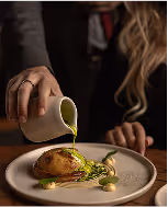 Chef garnishing festive plate, captured at Neighbourhood — a refined christmas restaurant kildare experience in County Kildare.
