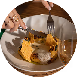 Hand cutting roasted Gnochi, house favourite vegetarian dish, captured at Neighbourhood — an acclaimed restaurant Naas experience in County Kildare.