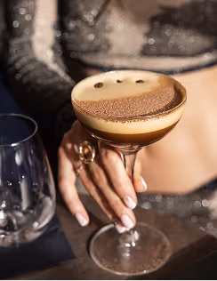 Bartender finishing espresso martini at bar, captured at Neighbourhood — an acclaimed restaurant Naas experience in County Kildare.