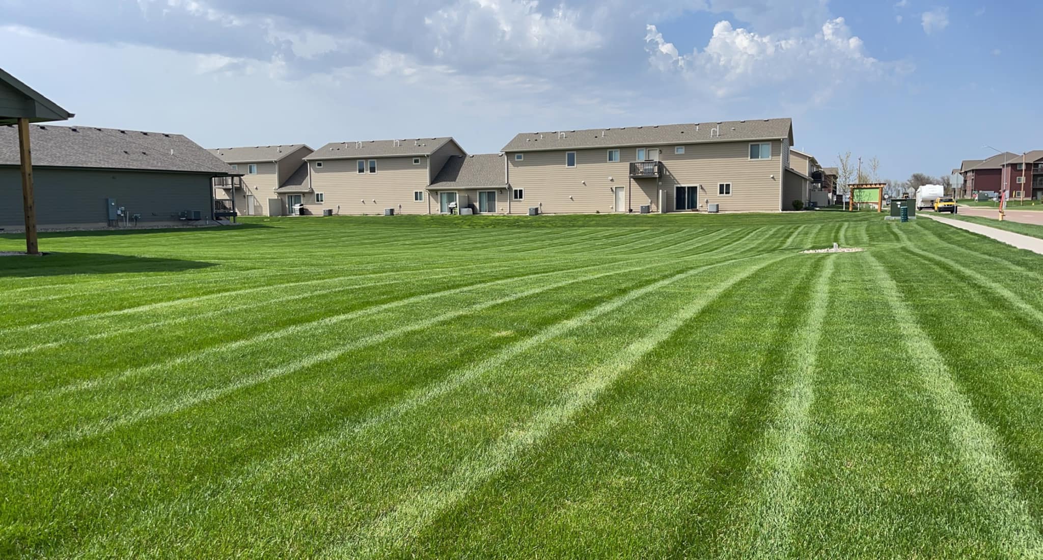 Photo of a beautiful commercial lawn maintained by Property Care Pros