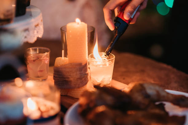 Close-up of citronella candles burning on a patio to help keep flies away from patio areas