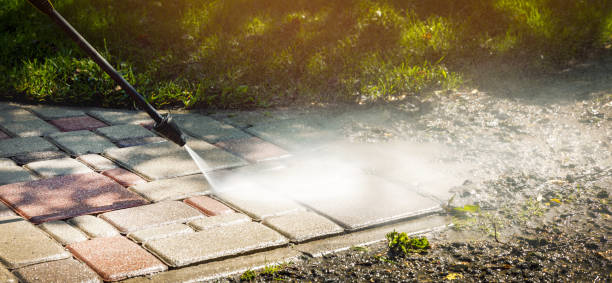 Pressure washing paver stones to lift deep-set stains