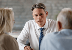 Image of lawyer speaking to two people