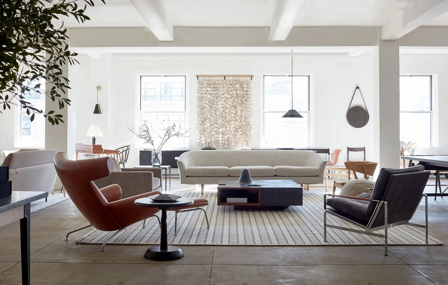 A living room filled with lots of furniture.