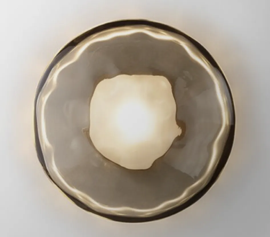 A light that is inside of a glass bowl.
