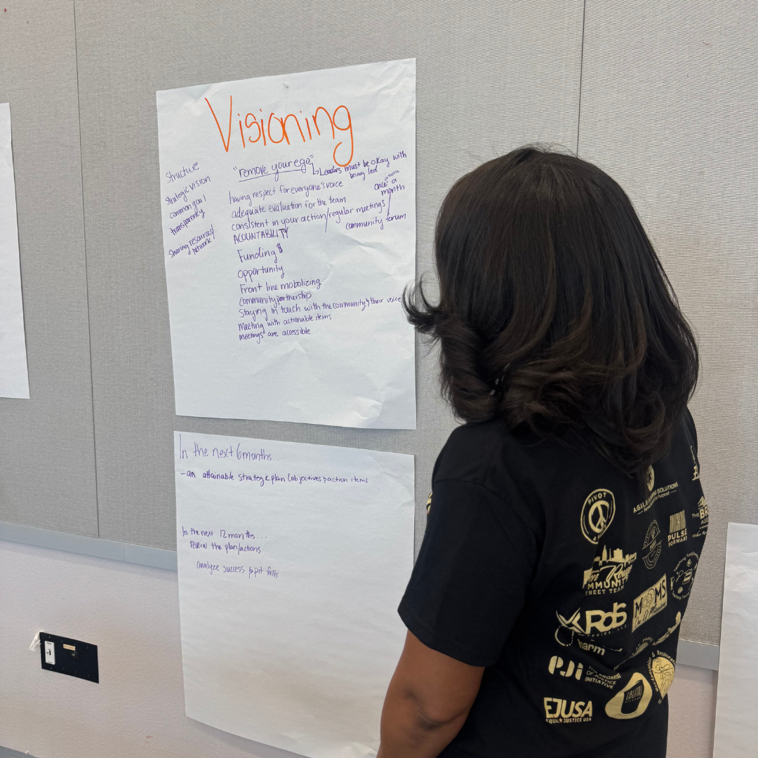 image of volunteer teaching children