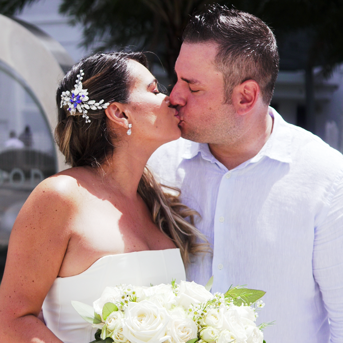 Couple kissing after a wedding.